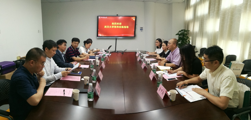 Wuhan University Hongyi School Visit to Exchange Ideas